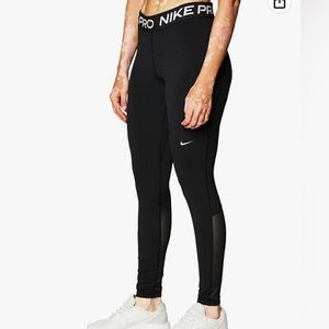 Nike Pro - Black leggings with lower mesh panels on the back